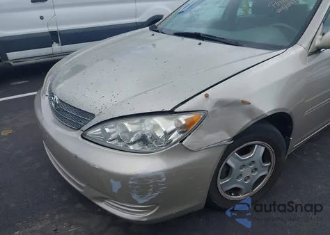 2003 Toyota Camry Le V6 z USA, uszkodzony, nr VIN 4T1BF32K23U046400